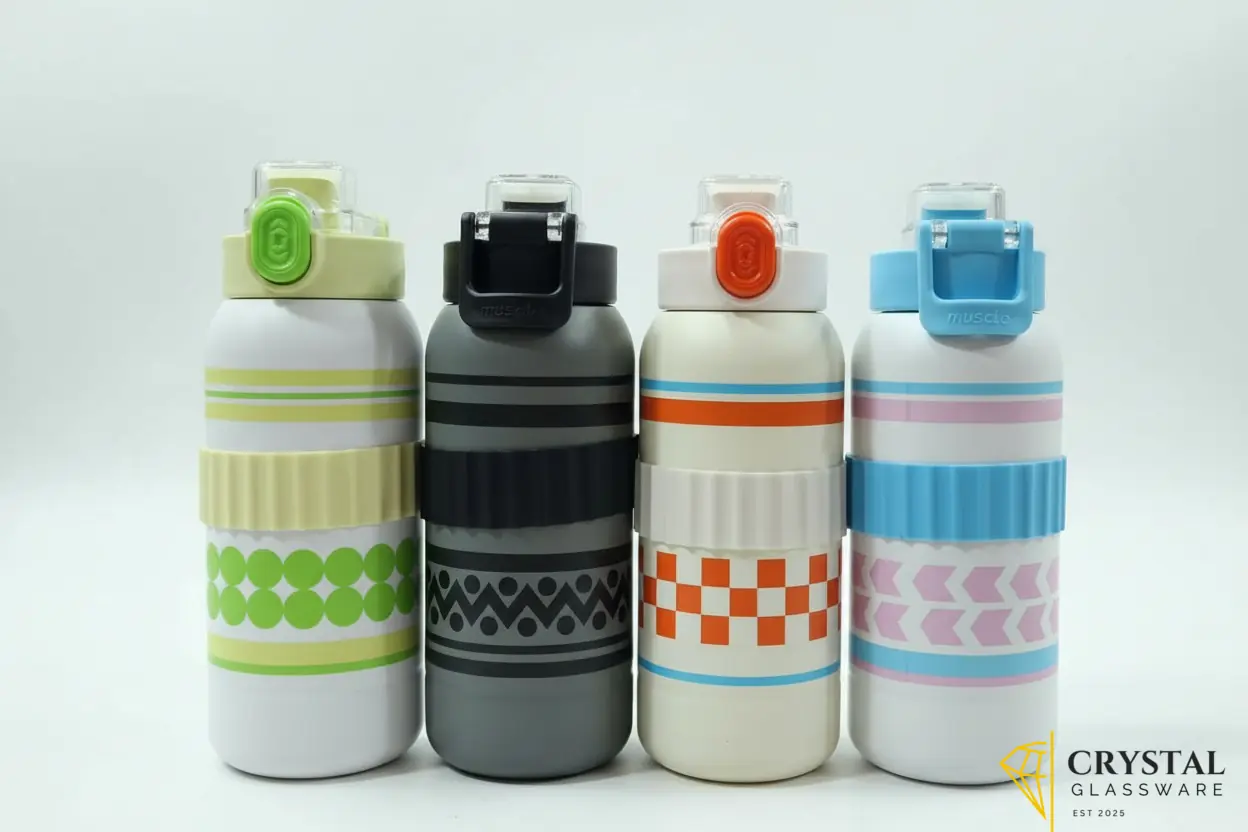 Bingo vacuum-insulated thermal water bottle featuring a patterned silicone grip sleeve and a flip-top lid — Crystal Glassware Pakistan